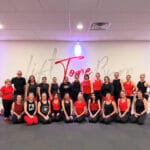 Pure Barre Kalamazoo group posing for picture