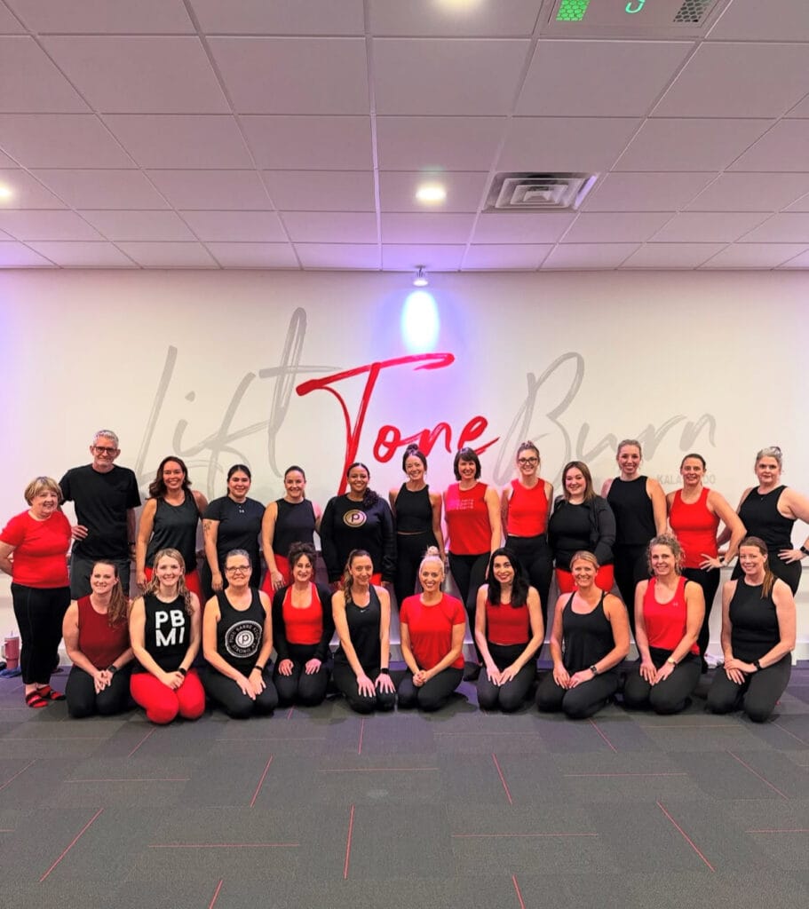 Pure Barre Kalamazoo group posing for picture